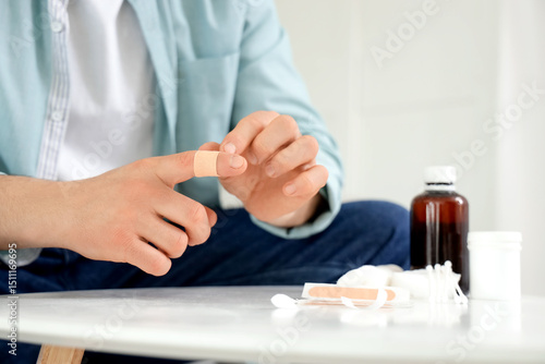 Young man applying medical ...