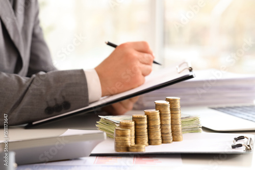 Businessman counting money ...