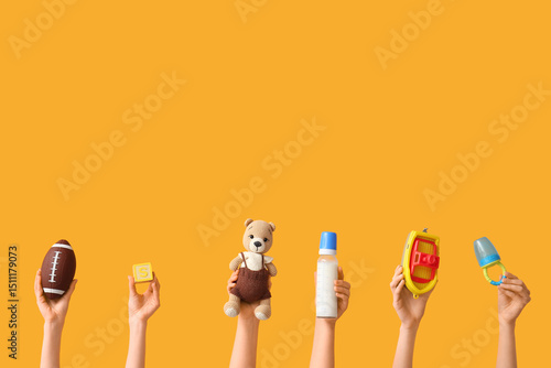 Hands holding baby accessor...