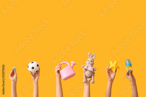 Hands holding baby accessor...