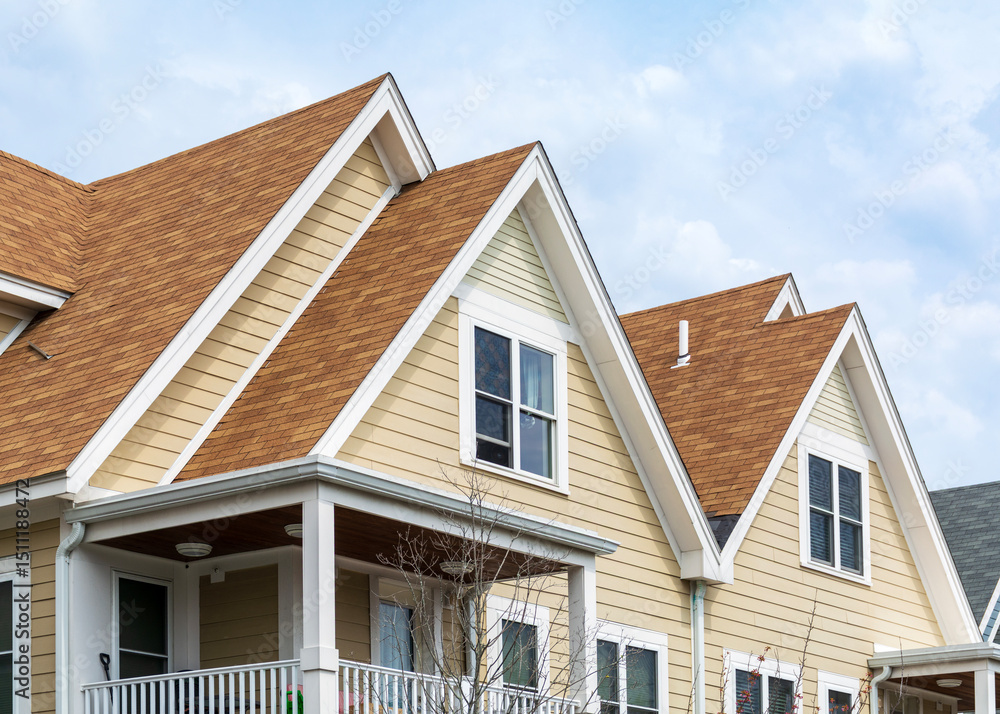 Upper facades of charming family home with composite roofing and balcony in Brighton, Massachusetts, USA
Upper facades of charming family home with composite roofing and balcony in Brighton, Massachusetts, USA