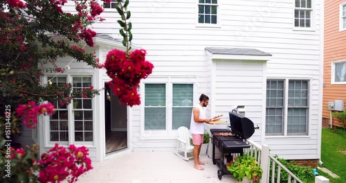 Man Grilling Skewers on Backyard – Relaxed Summer Lifestyle on Cozy Patio, Outdoor Cooking, Weekend Vibes, Family BBQ, Fourth of July Celebration, Real Life and Seasonal Home Scene