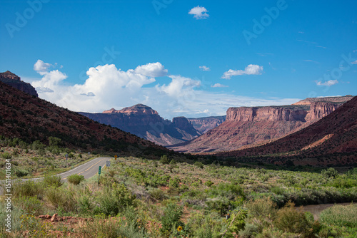 Canvas Print Highway and red cliffs along Unaweep-Tabeguache scenic byway