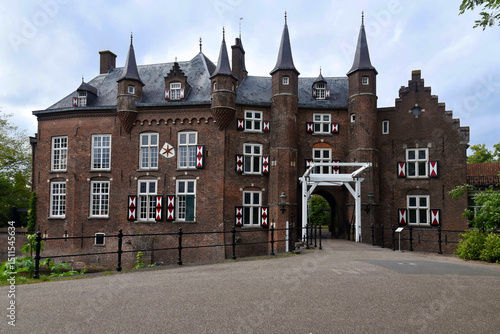 The front entrance of the Maurick Castle, near Vught, Netherlands. Shot on a cloudy day. 

