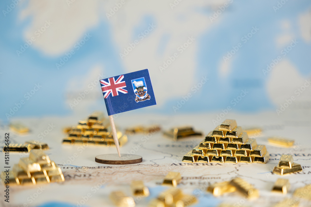 Naklejka premium Falkland Islands flag stands prominently on a global map, surrounded by glistening gold bars, signifying national wealth, strategic resources, and economic investment potential