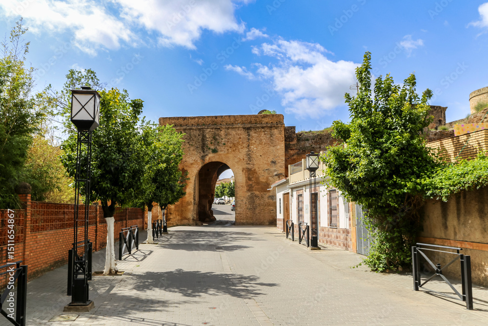 Fototapeta premium 12th-century Seville Gate in Niebla Castle, Andalusia, Spain
