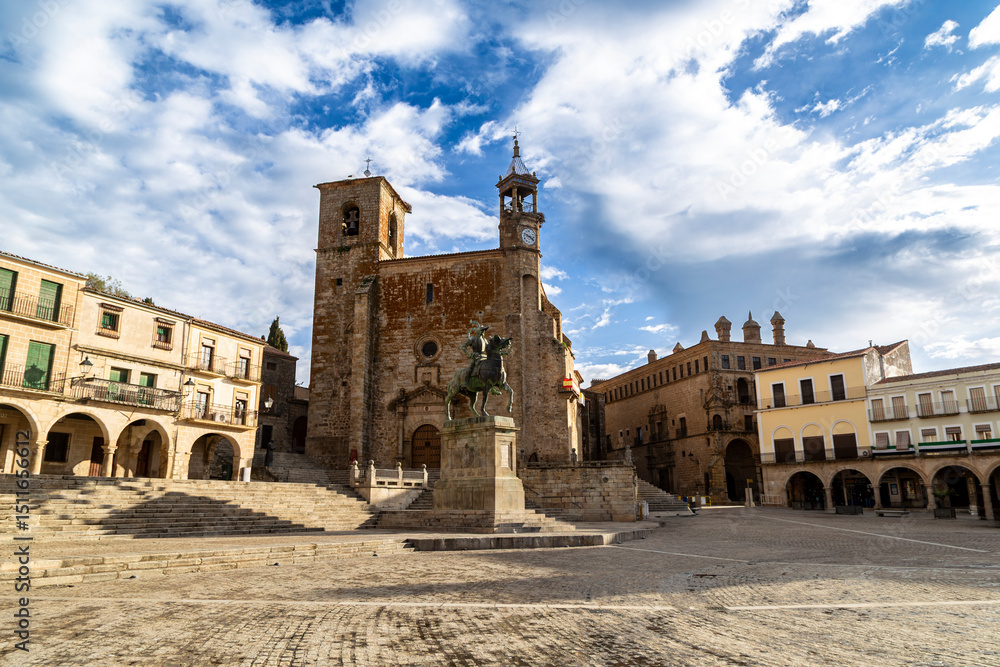 Fototapeta premium Historic Plaza Mayor of Trujillo, Spain, Featuring Church of San Martín and Pizarro's Equestrian Statue