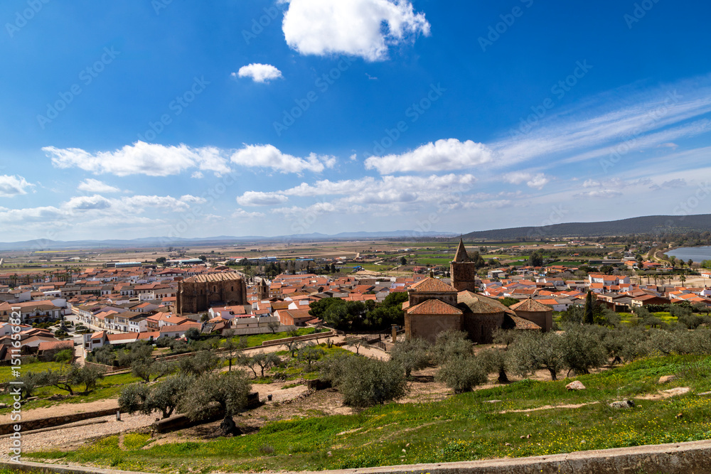 Naklejka premium Panoramic View of Historic Medellín Village with Santiago Church and Olive Groves in Spain