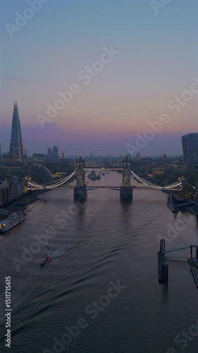 Wallpaper Mural The stunning aerial footage beautifully captures the breathtaking sight of Tower Bridge and the iconic London skyline at twilight, with the enchanting River Thames flowing gracefully beneath it Torontodigital.ca