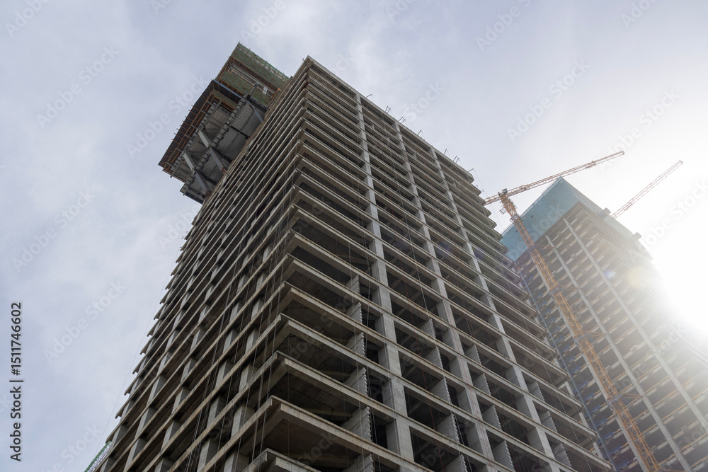 Fototapeta premium Construction of high-rise office building
