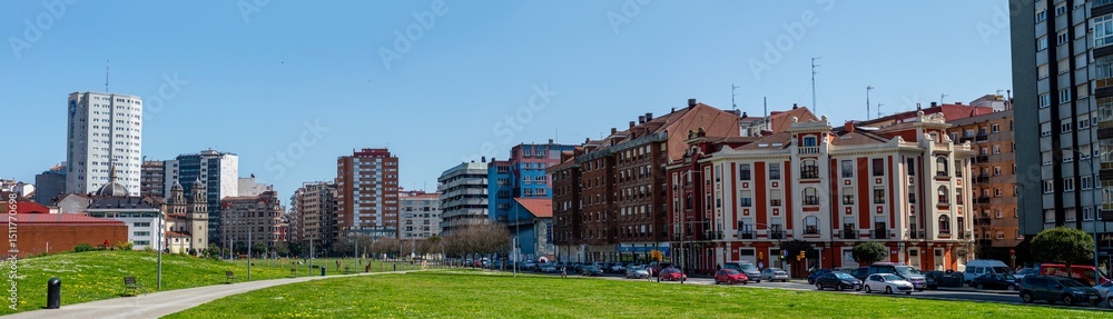 Fototapeta premium Gijón is a vibrant coastal city in Asturias, Spain, known for its beaches, culture, and maritime heritage.