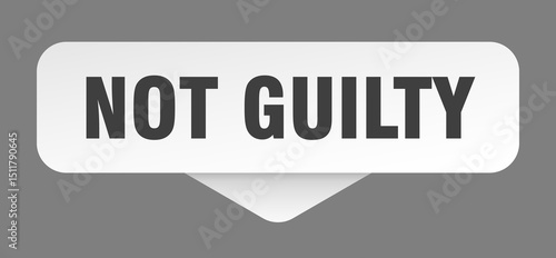 not guilty sticker. not guilty sign isolated on gray background