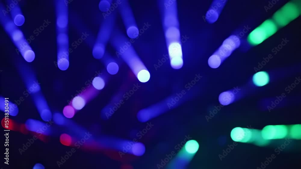 Dynamic bokeh lights illuminate the scene with vibrant colors and movement