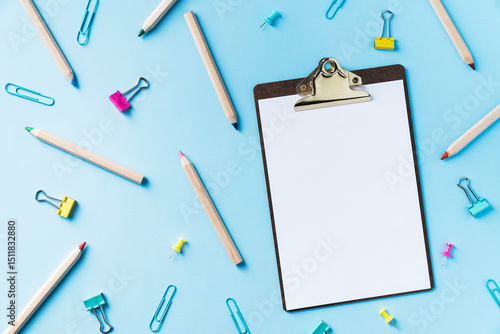 Wallpaper Mural Colorful back to school flat lay and clipboard on blue background Torontodigital.ca