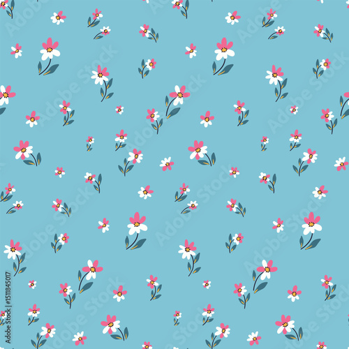 Seamless floral pattern, liberty ditsy print of small daisy flowers on blue field. Cute botanical surface design of tiny flowers, simple mini plants. Textile fashion print. Vector illustration.