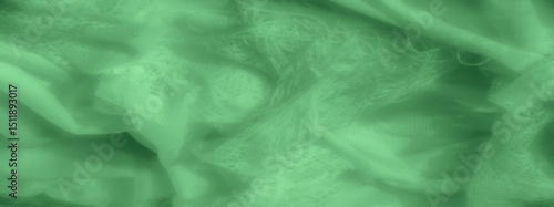 Foto Blurred soft fabric draped in gentle folds, showcasing a delicate lace-like texture