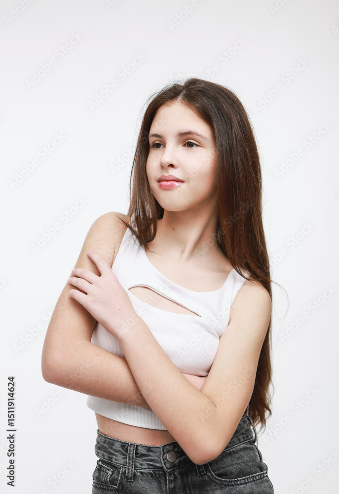 Portrait of a brunette in a white tank top. Portrait of a brunette in a white tank top.