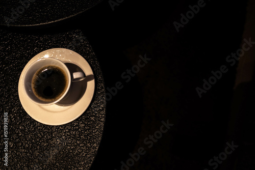 cup of coffee on black background