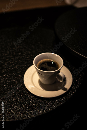 cup of coffee on black background