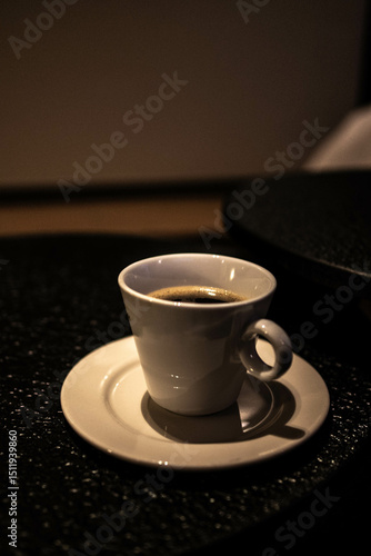 cup of coffee on black background
