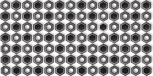An abstract geometric pattern composed of black and white hexagons arranged in clusters and linear formations, creating a mosaic-like design with a subtle sense of depth.Some hexagons are solid black,