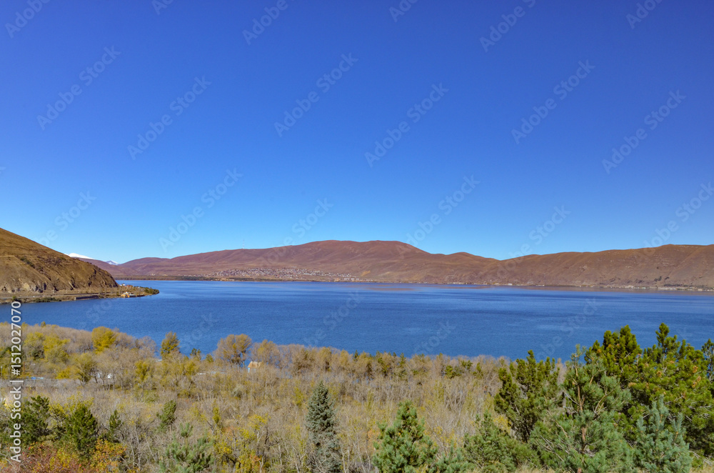 Obraz premium northern coast of Lake Sevan and Areguni mountain range scenic view from Sevanavank monastery (Gegharkunik Province, Armenia)