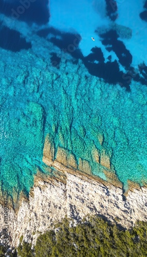 Clear Blue Sea and Rocky Shore