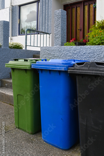 Colorful Recycling Bins for Waste Sorting Outside Residential House. Eco-Friendly Waste Separation System in Iceland.