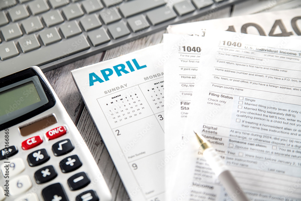 Filling out tax form 1040. Calculator, coins, glasses, form and pen on your desk. state taxes and calculating your tax return. Filling out tax form 1040. Calculator, coins, glasses, form and pen on your desk. state taxes and calculating your tax return.