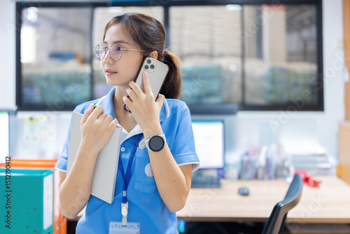 The Asian female employee handled both office planning and industrial plant coordination, helping the export business achieve on-time delivery to international clients. Free Download The Asian female employee handled both office planning and industrial plant coordination, helping the export business achieve on-time delivery to international clients. - GFXLoad
