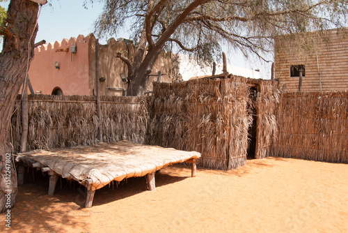 Traditional coastal emirati people house or al bait sahel, constructed from palm fronds. These structures show sustainable desert architecture used by coastal and desert communities in the UAE