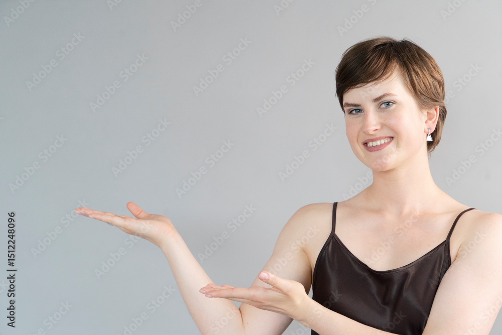 Happy young girl isolated over gray background Happy young girl isolated over gray background