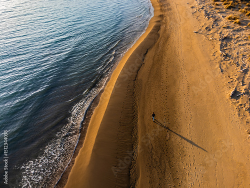 Me strolling on the wild Alberese beach in the evening with low tide