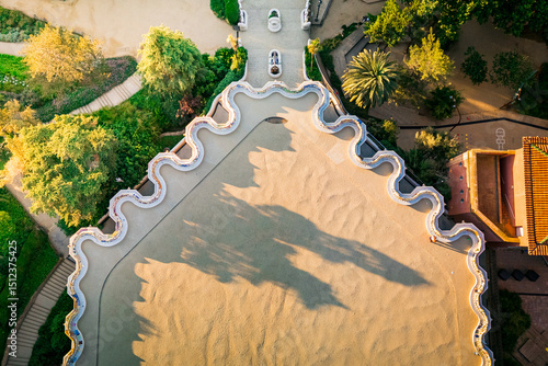 Photography aerial view of Parc Guell tourist attraction in Barcelona, Spain, landamark arch