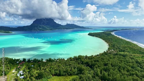 Drone aerial view Bora Bora Tahiti. Tropical paradise island, turquoise crystal clear water lagoon. French Polynesia. Exotic travel vacation getaway, romantic honeymoon destination