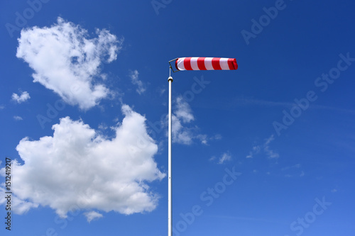 windsock in the colours red white striped