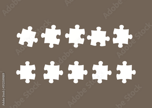 Ten White Puzzle Pieces Arranged in Two Rows on Brown Background