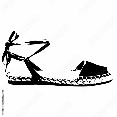 Black and white espadrille sandal with ankle ties and woven sole  