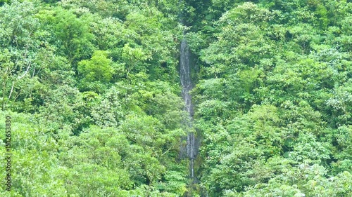 Costa Rica A long w aterfall in the Braudio Carrilo National Park