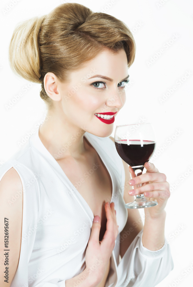 Woman drinking wine. Smiling woman in white dress with wine glass. Beautiful girl tasting old expensive red wine from glass. Sexy woman with perfect makeup and retro hairstyle enjoys aroma of wine. Woman drinking wine. Smiling woman in white dress with wine glass. Beautiful girl tasting old expensive red wine from glass. Sexy woman with perfect makeup and retro hairstyle enjoys aroma of wine.
