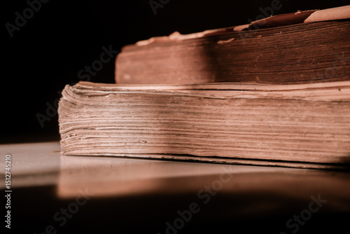 Wallpaper Mural Close-Up of Old Book Pages in Dramatic Lighting Torontodigital.ca