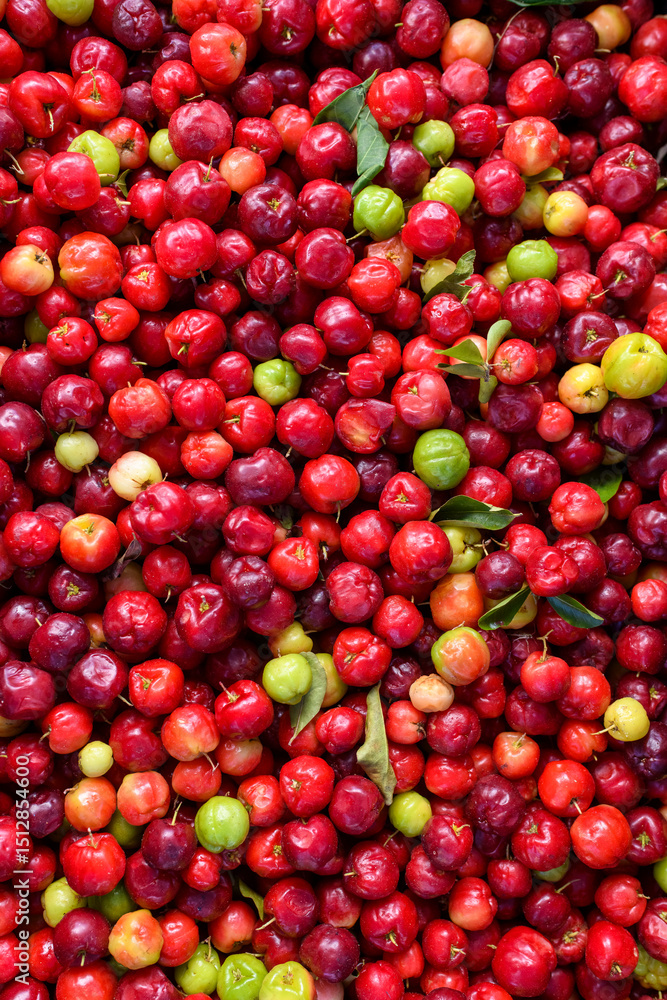 Fresh acerola cherries displayed at a street market Fresh acerola cherries displayed at a street market