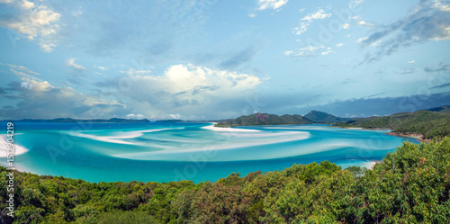 Surrounded by tropical rainforest, the paridise beach of Whitehaven on Whitsunday Island, Queensland, Australia