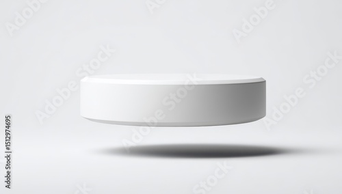 Floating white circular pedestal