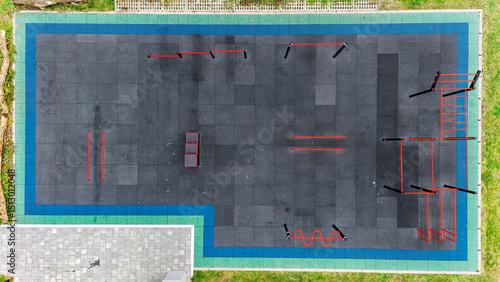 Fotografie Outdoor gym for street workout aerial drone view, modern sports ground with bars