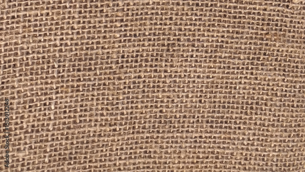Jute pattern, rough burlap texture, canvas coarse cloth, brown woven rustic bagging. Natural hessian beige textile texture. Linen fabric backdrop. Threads background. Sackcloth surface. 