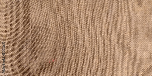 Jute pattern, rough burlap texture, canvas coarse cloth, brown woven rustic bagging. Natural hessian beige textile texture. Linen fabric backdrop. Threads background. Sackcloth surface. 