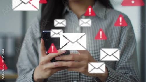 Person Holds Smartphone with Email Icons and Red Alerts Against Blurred Office Setting