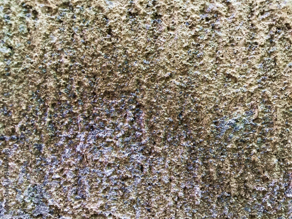 Fototapeta premium Close-up of a textured concrete wall with raw and gritty surface. Ideal for use as a grunge background or overlay in design projects.