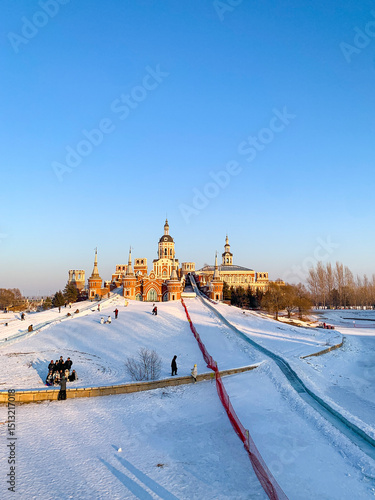 Volga manor, Russian village theme park with classic Russian architecture on a beautiful sunny winter day with a blue-sky, in Harbin, China 
